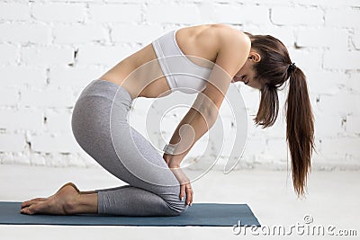 Yoga Indoors: Uddiyana Bandha Stock Photo