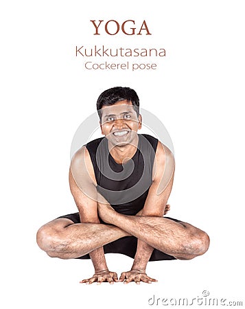 Yoga Kukkutasana cockerel pose Stock Photo