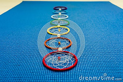 Yoga mat and chakra symbol Stock Photo