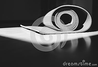 Yoga mat is on the floor black and white image Stock Photo