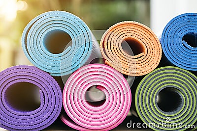 Yoga mats in the garden Stock Photo