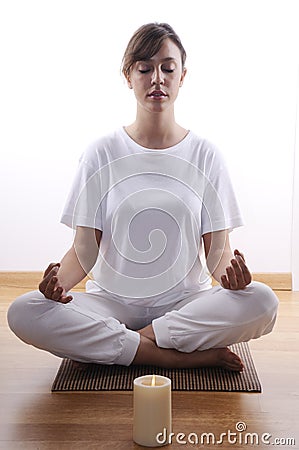 Yoga and meditation of young woman Stock Photo