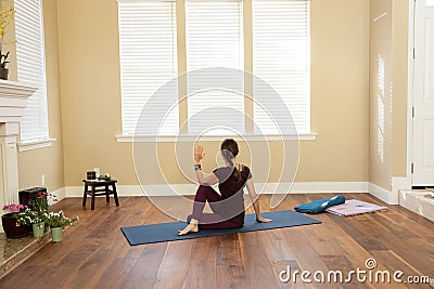 Yoga Pose Sage Twist Right seated Stock Photo