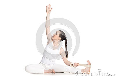 Yoga with props, Parivrtta Janu Sirsasana Stock Photo