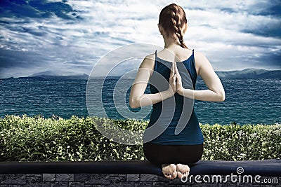 Yoga on terrace Stock Photo