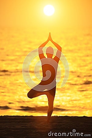 Yoga tree pose Stock Photo