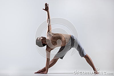 Yoga Triangle pose Stock Photo