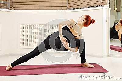 Yoga twist pose Stock Photo