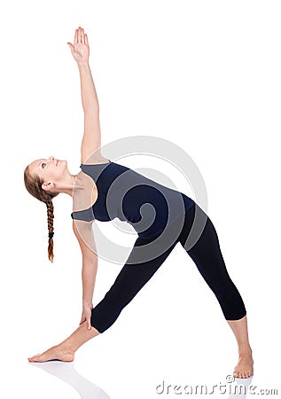 Yoga utthita trikonasana triangle pose Stock Photo