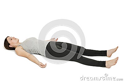 Yoga woman gray_shavasana Stock Photo