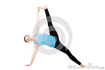 Yogi female in yoga asana Vasisthasana Stock Photo