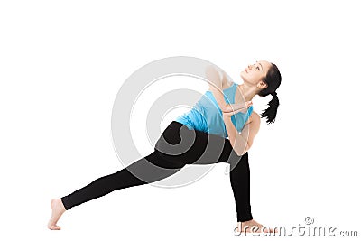 Yogi female in yoga Pose parivritta parshvakonasana Stock Photo