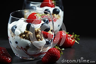 Yogurt with fresh berry and granola Stock Photo