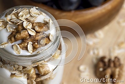 yogurt made from milk with walnuts and muesli Stock Photo