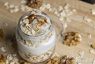 yogurt made from milk with walnuts and muesli Stock Photo