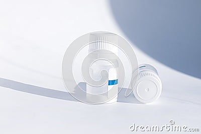 Yogurt starter cultures in medicine bottle on white background. Homemade fermented milky drinks. Healthy eating, diet Stock Photo