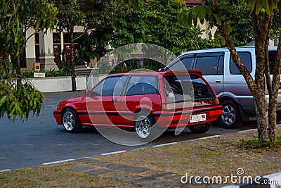 Red Honda Civic wonder sb3 on Black Auto Battle Yogyakarta 2023 parking lot Editorial Stock Photo