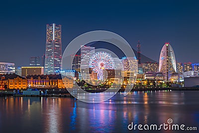 Yokohama city skyline over the Mt Fuji at sunset time Stock Photo