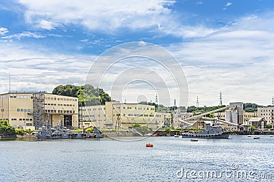 Support vessel Yard Tag boats of the Japan Maritime Self-Defense Force in Yokosuka Naval Port. Editorial Stock Photo