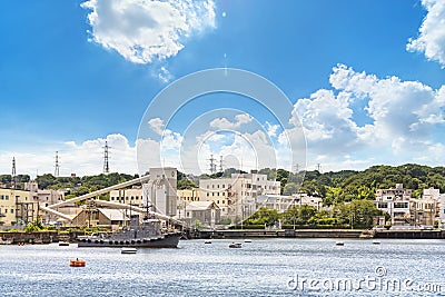 Support vessel Yard Tag boats of the Japan Maritime Self-Defense Force in Yokosuka Naval Port. Editorial Stock Photo