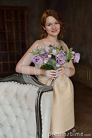 Yong girl in classical interior Stock Photo