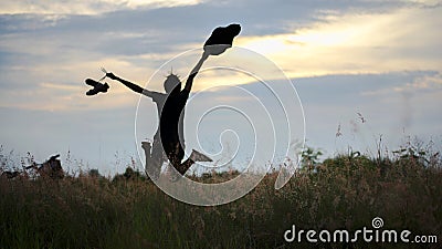 Yong woman in meadow. travel and sunset Stock Photo