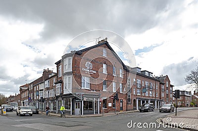 Old brick buildings at street corner on Monkgate and St Maurice Road in historic district of City of York, England, UK Editorial Stock Photo