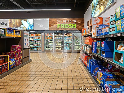 The Dairy Section and Biscuit Aisles of Aldi Food Market Editorial Stock Photo