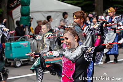 YOSAKOI Soran Festival. Powerful dance performances parade in Odori Park, Sapporo City. Editorial Stock Photo
