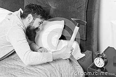 Although you are asleep you may wake up feeling like did not sleep at all. Catch up on missed sleep during weekend Stock Photo