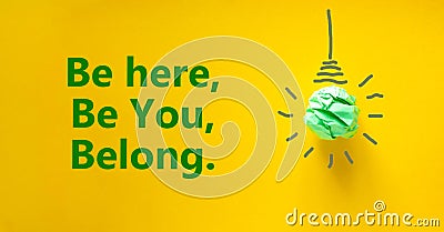 You belong here symbol. Green shining light bulb icon. Words Be here, be you, belong. Beautiful yellow background. Diversity, Stock Photo