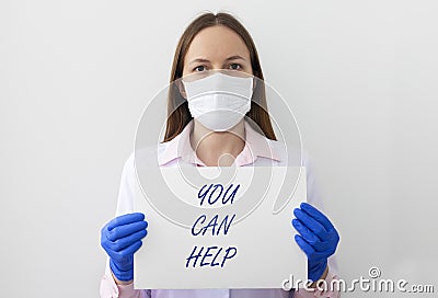 You Can Help inscription text on paper in doctor hands Stock Photo