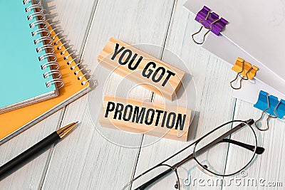 YOU GOT PROMOTION - words written on wooden blocks Stock Photo