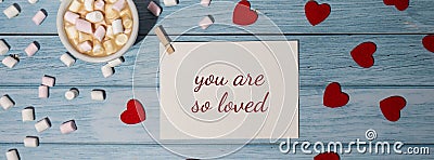 YOU ARE SO LOVED text on valentine postcard inscription positive quote phrase Banner Romantic Valentine day Greeting Stock Photo