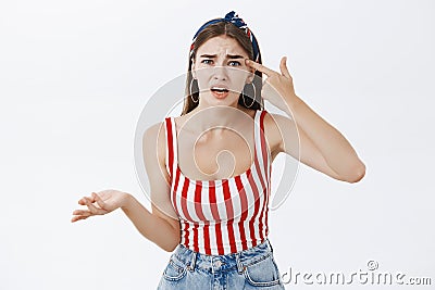 You out of your mind or sick. Portrait of irritated and annoyed fed up girlfriend in stylish striped top and headband Stock Photo