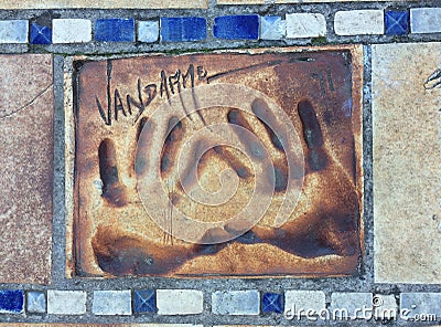 Hand print of Jean Claude Van Damme in Cannes on the Boulevard de la Croisette directly in front of the Palais des Festivals Editorial Stock Photo