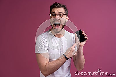 You will have problems man! Portrait of angry confused aggressive in bad mood guy shouting threatening in the loud Stock Photo