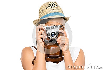 You wont believe your eyes. a young woman taking photos using her digital camera against a studio background. Stock Photo