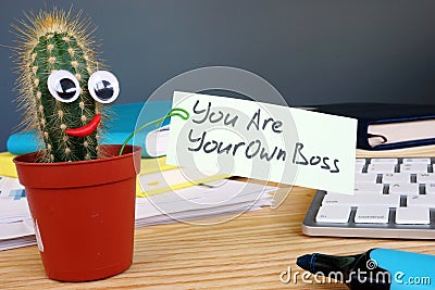 You are your own boss sign on the desk Stock Photo