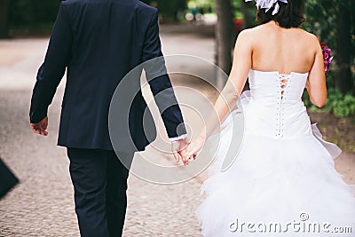 A youg couple holding their hands Stock Photo