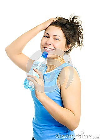 Yougn woman drinking mineral water Stock Photo