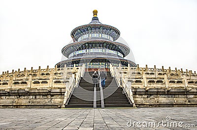 Yound Couple in front of the Temple of Heaven imperial complex of religious buildings in southeastern part of Beijing Stock Photo