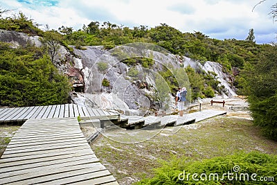 Young active father with little daughter . Thermal area Orakei Korako in New Zealand Stock Photo
