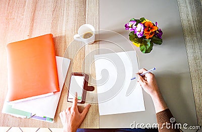 Young active man working hard and calculating at the desk Stock Photo