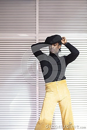 Young adult African American man posing in vintage look Stock Photo