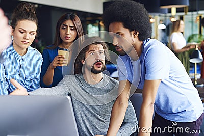 Young adult coworkers having arguments Stock Photo