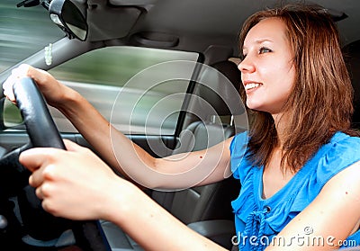 Young adult girl driving a car first time Stock Photo