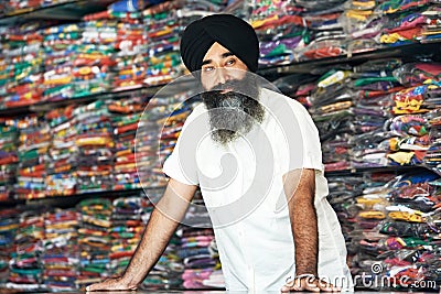 Young adult indian sikh seller man Stock Photo