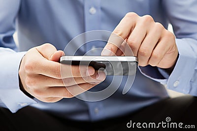 Young adult using a smart phone Stock Photo