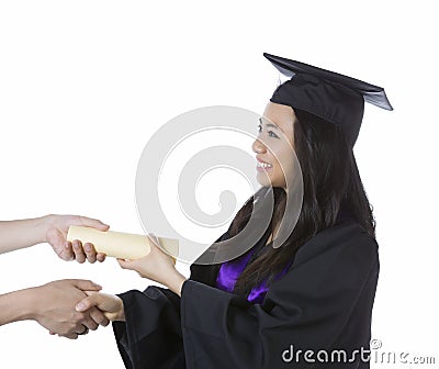 Young Adult Woman Receiving her Diploma while Graduating Stock Photo